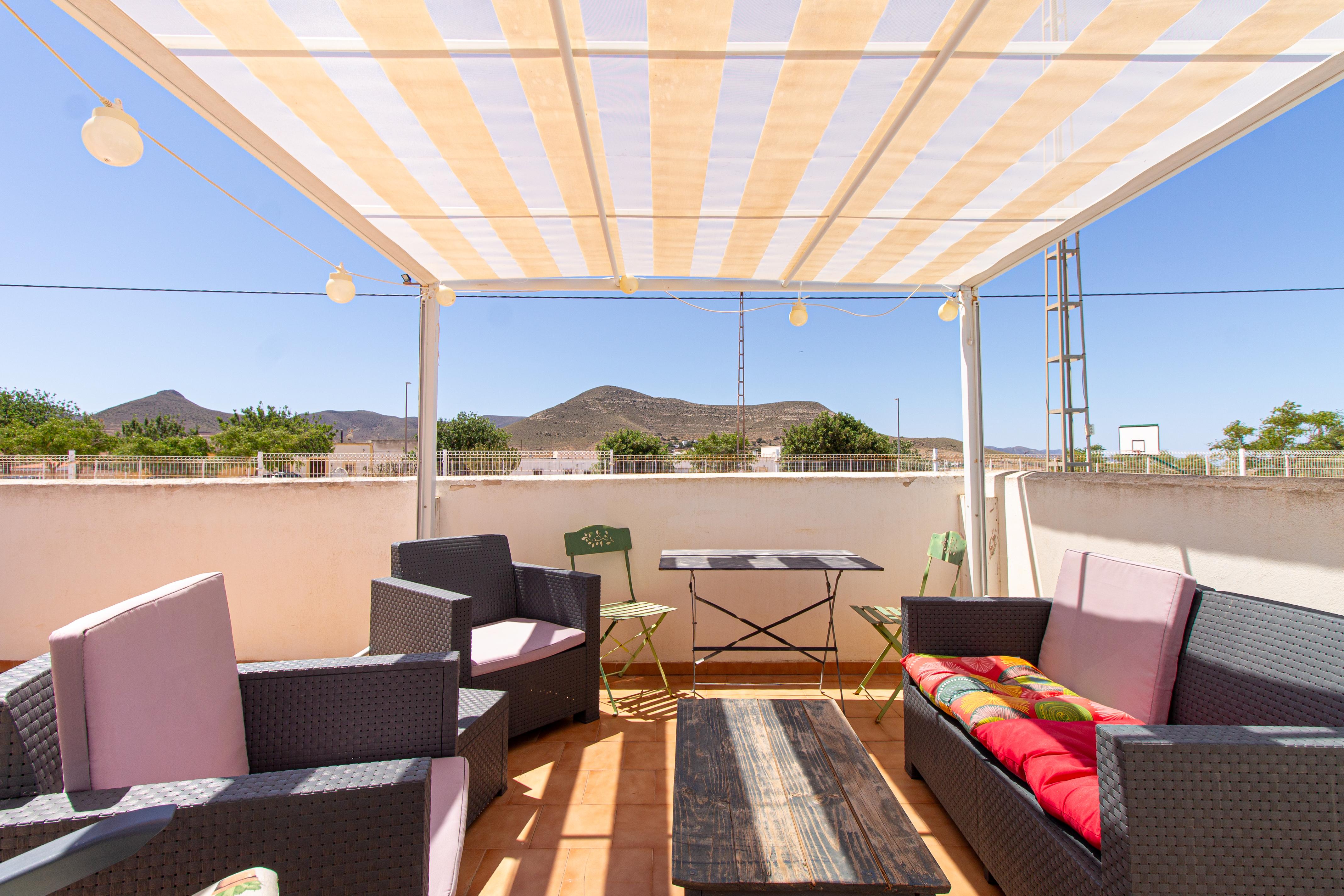 Casa con piscina comunitaria